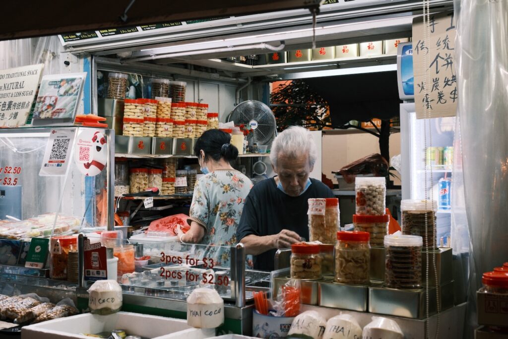 Street food vendor at Singapore Chinatown Lunar New Year Bazaar.
